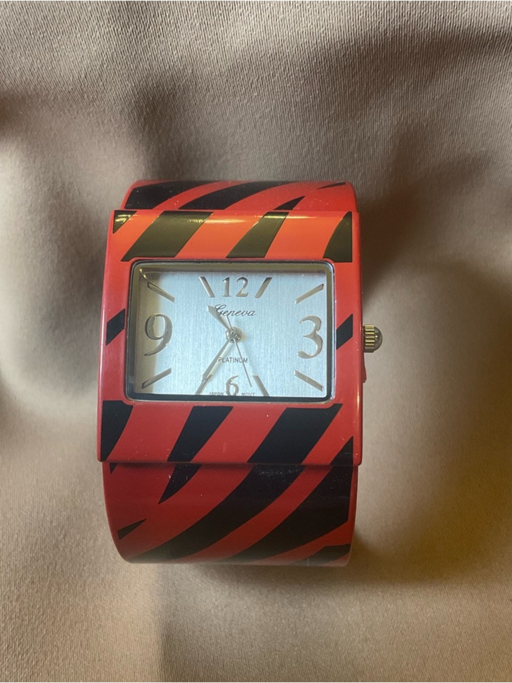 Geneva Red and Black Striped Wide Cuff Watch with Gold Accents. Needs battery